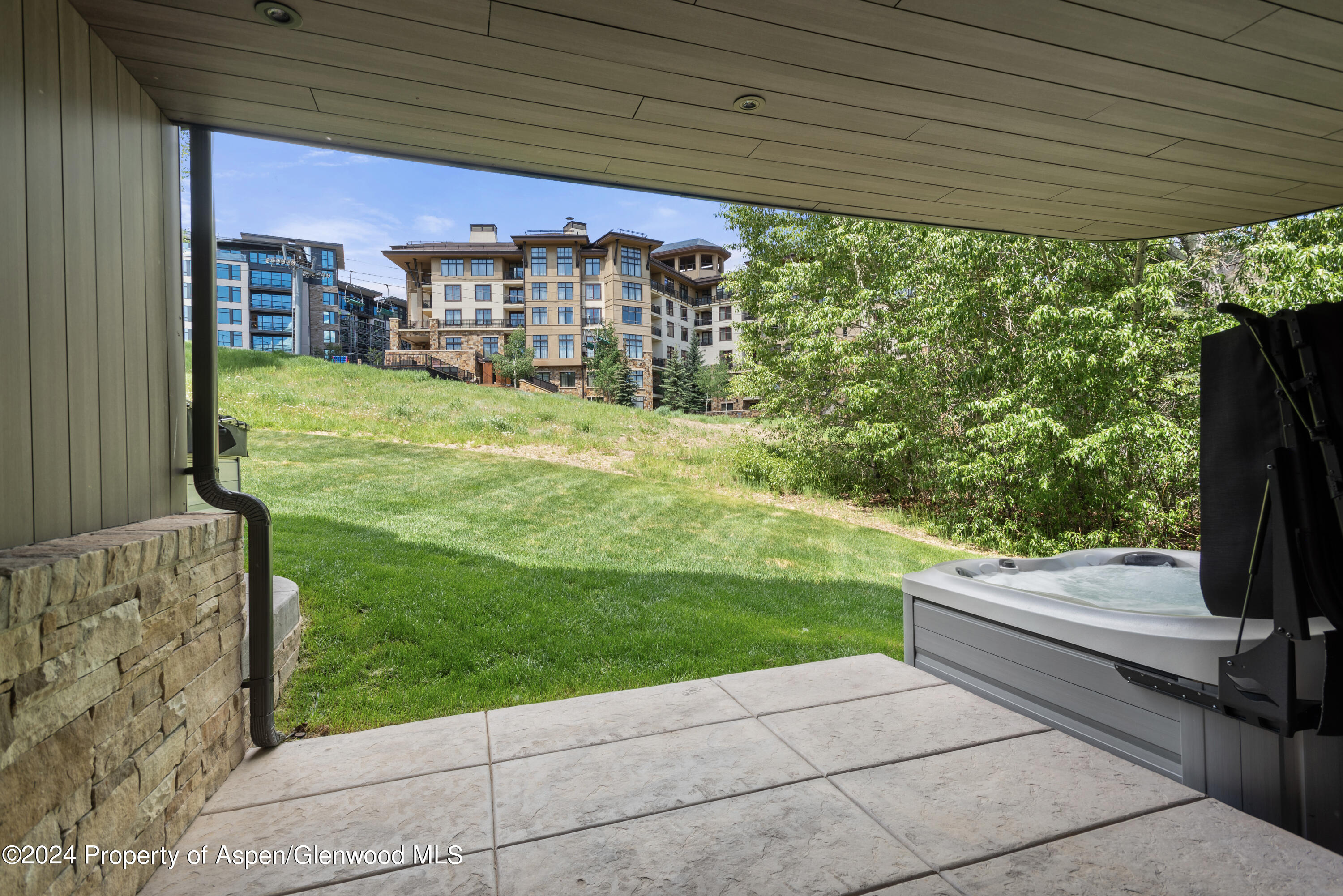 381 Ridge Road, Unit C4 Snowmass Village, CO 81615 - Photo 35 of 43 a view of a porch with a yard