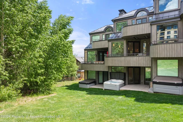 a view of a garden with houses