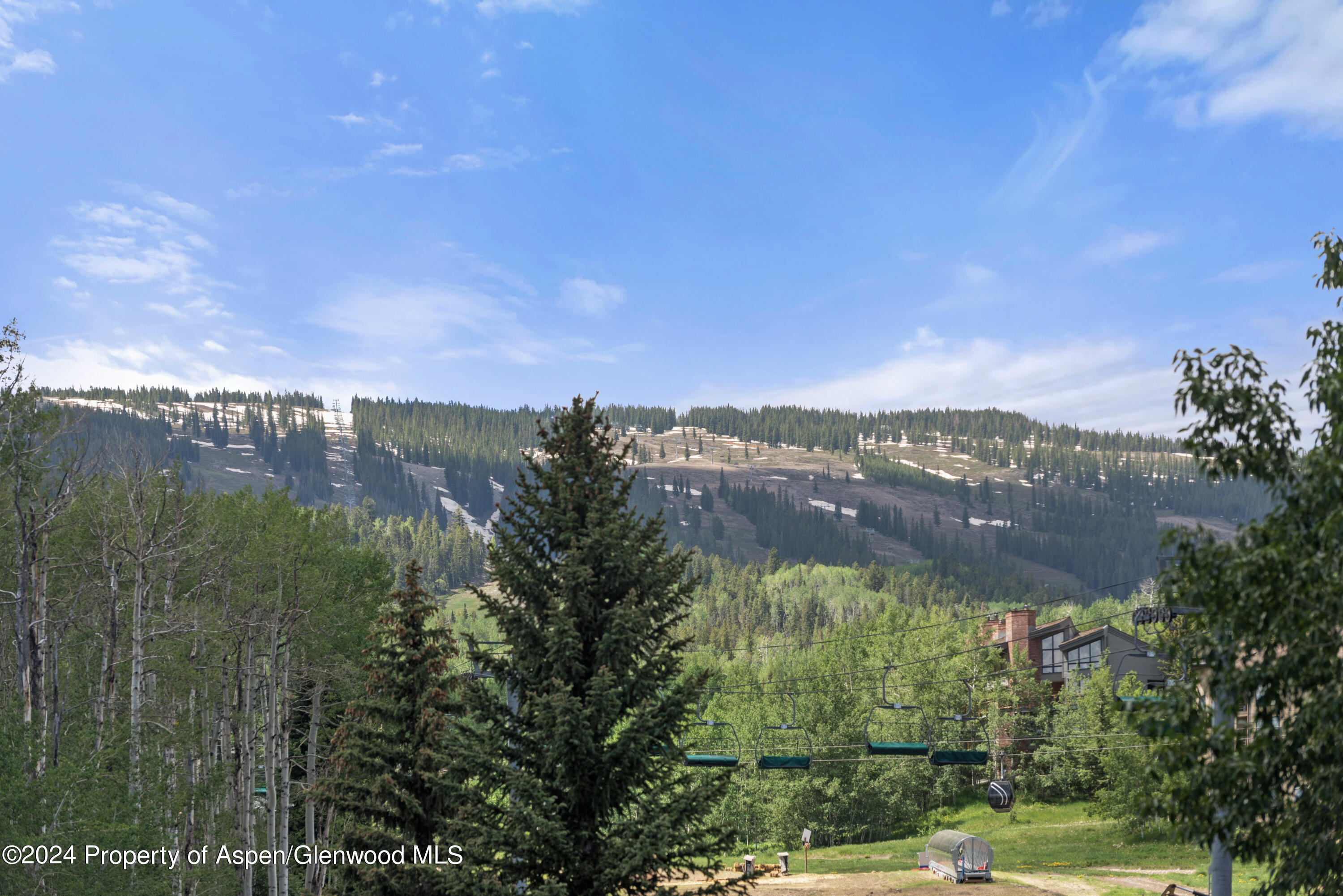 381 Ridge Road, Unit C4 Snowmass Village, CO 81615 - Photo 41 of 43 a view of a lake with a city