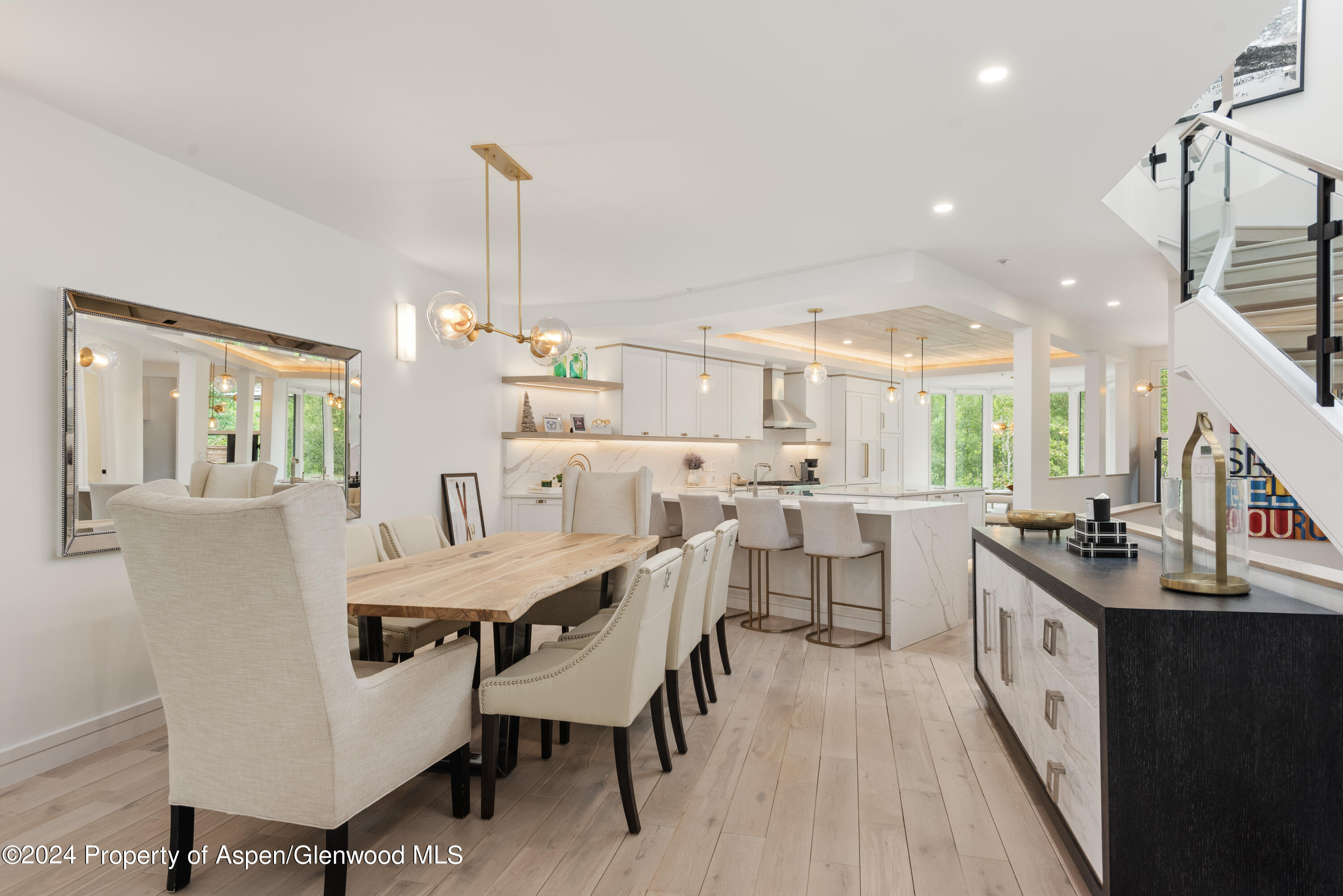 381 Ridge Road, Unit C4 Snowmass Village, CO 81615 - Photo 5 of 43 a large kitchen with a table and chairs
