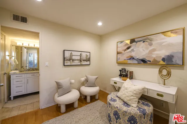 a living room with furniture and window