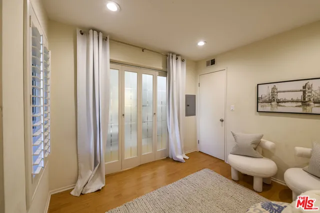 a bathroom with a tub and shower