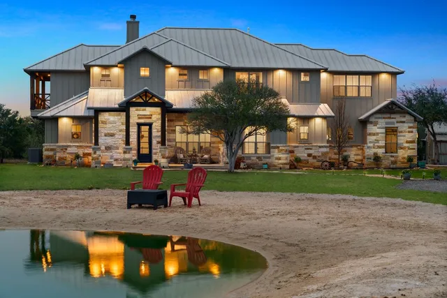 a view of a house with a swimming pool