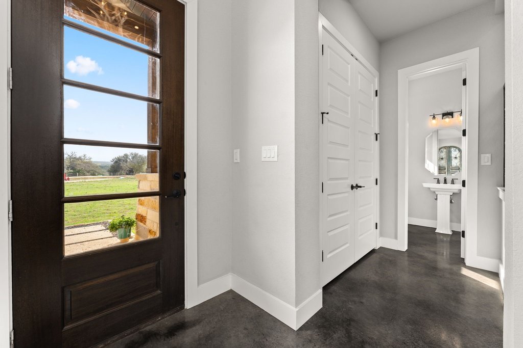 3830 Outback Trail Spicewood, TX 78669 - Photo 12 of 40 wooden floor with white walls