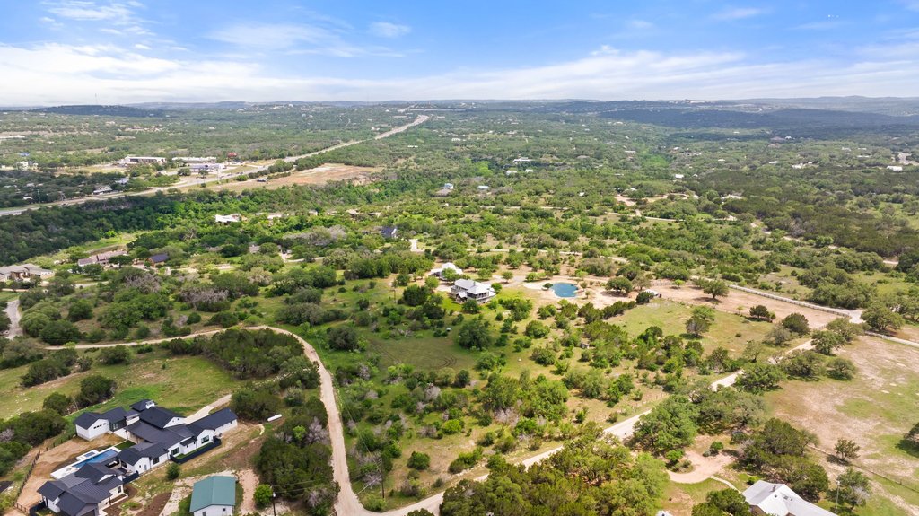 3830 Outback Trail Spicewood, TX 78669 - Photo 40 of 40 an aerial view of residential houses with outdoor space