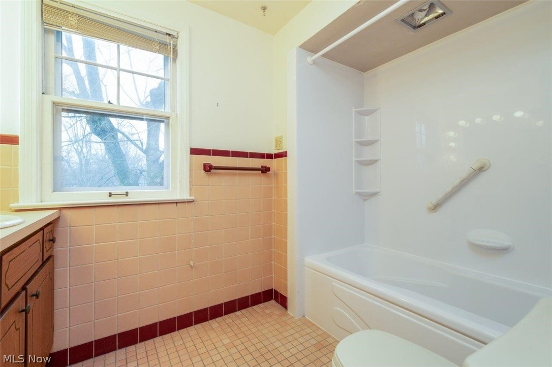 1159 Croyden Road Lyndhurst, OH 44124 - Photo 12 of 18 Full Bathroom with Shower over Bathtub