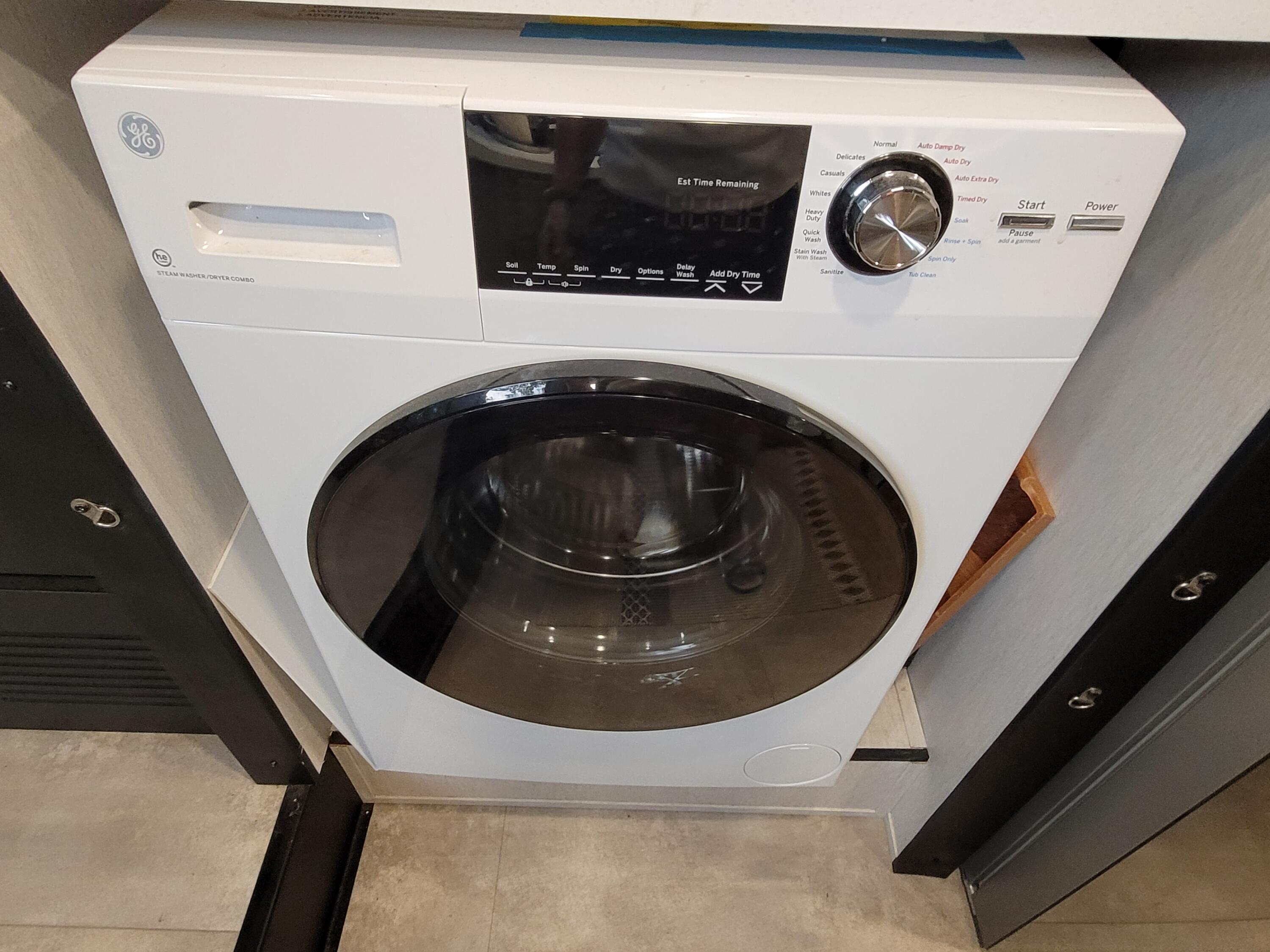 71 South Highland Road, Unit 235 Truro, MA 02666 - Photo 15 of 74 a utility room with dryer and washer