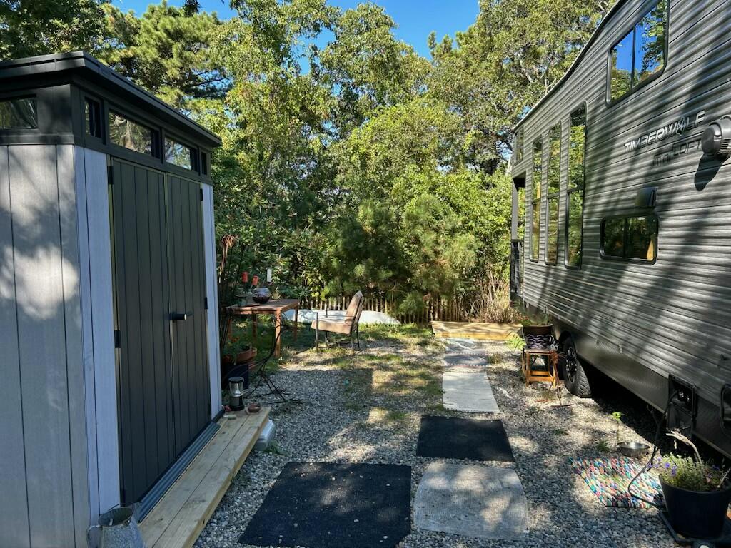 71 South Highland Road, Unit 235 Truro, MA 02666 - Photo 29 of 74 a view of yard from deck