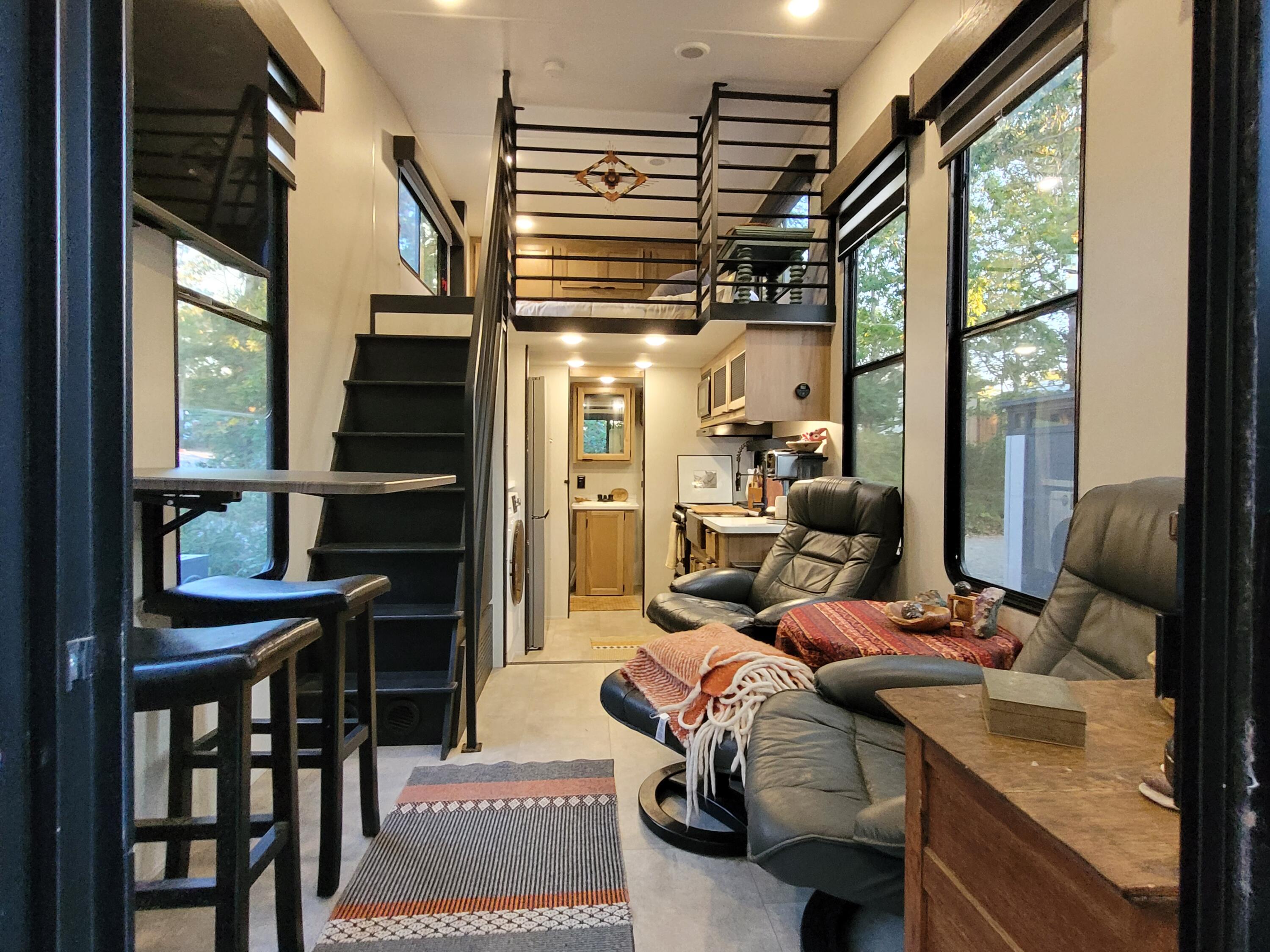 71 South Highland Road, Unit 235 Truro, MA 02666 - Photo 4 of 74 a living room with furniture a rug and a window