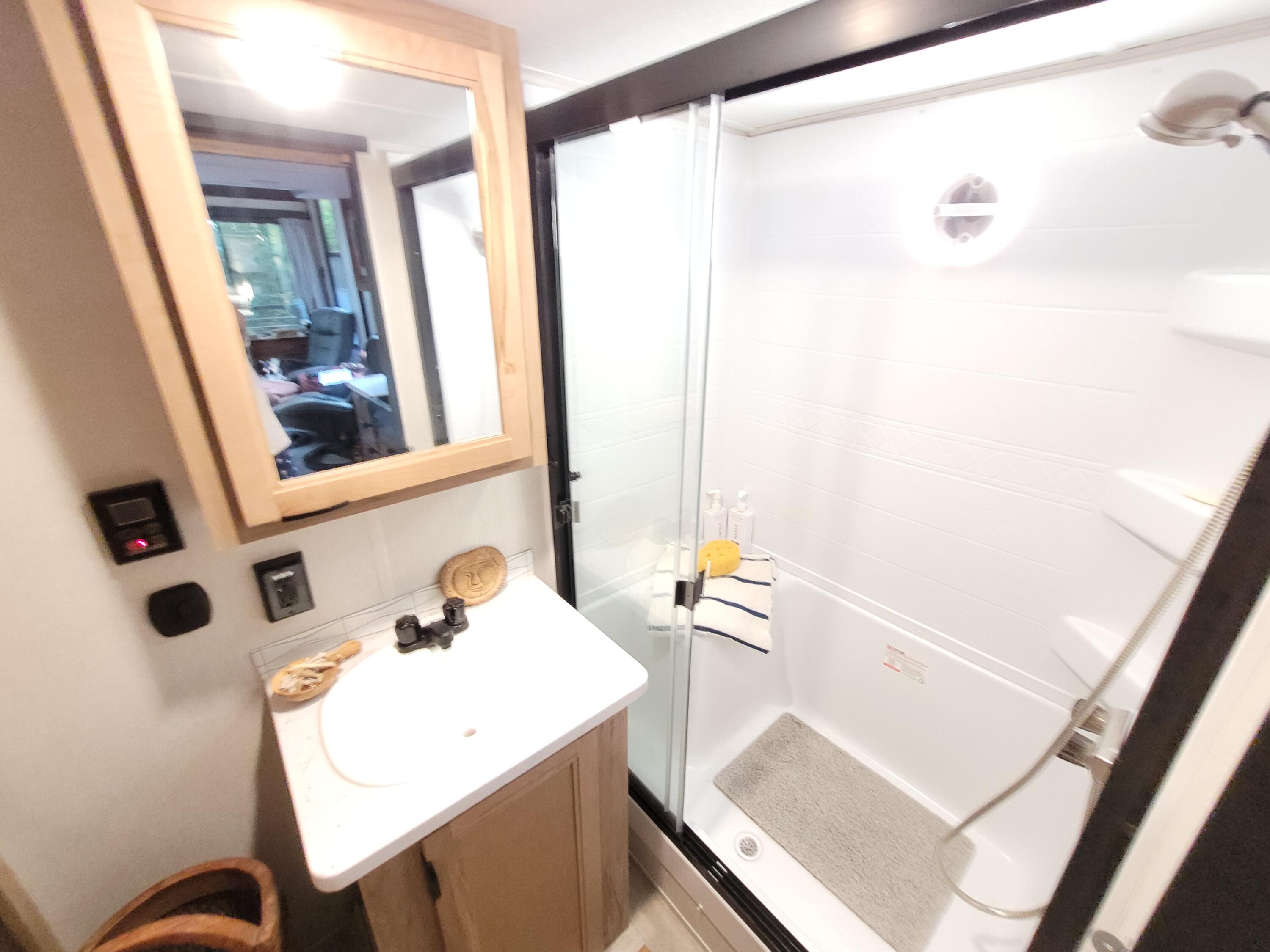71 South Highland Road, Unit 235 Truro, MA 02666 - Photo 53 of 74 a bathroom with a sink and a mirror
