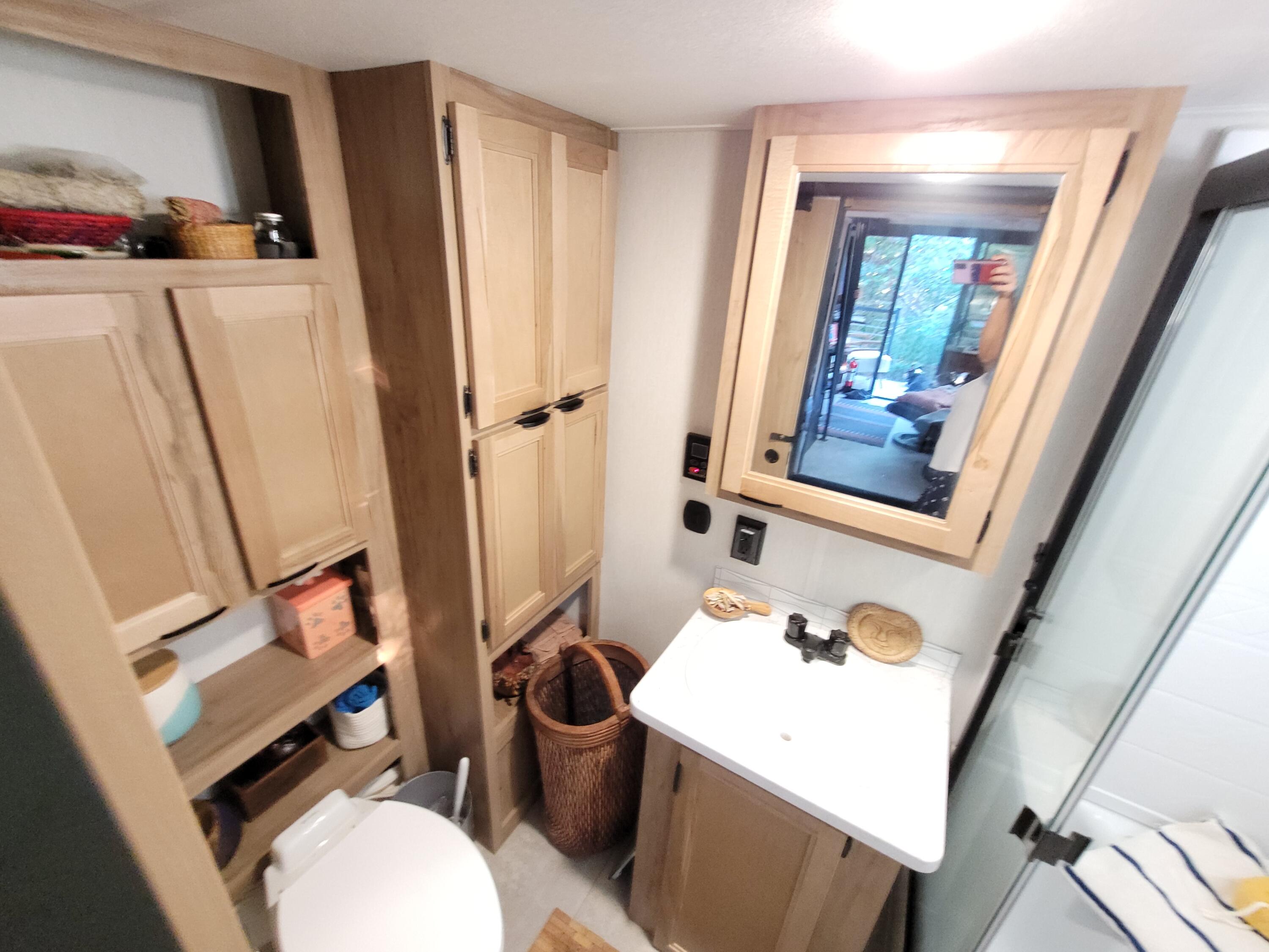 71 South Highland Road, Unit 235 Truro, MA 02666 - Photo 54 of 74 a bathroom with toilet sink and mirror