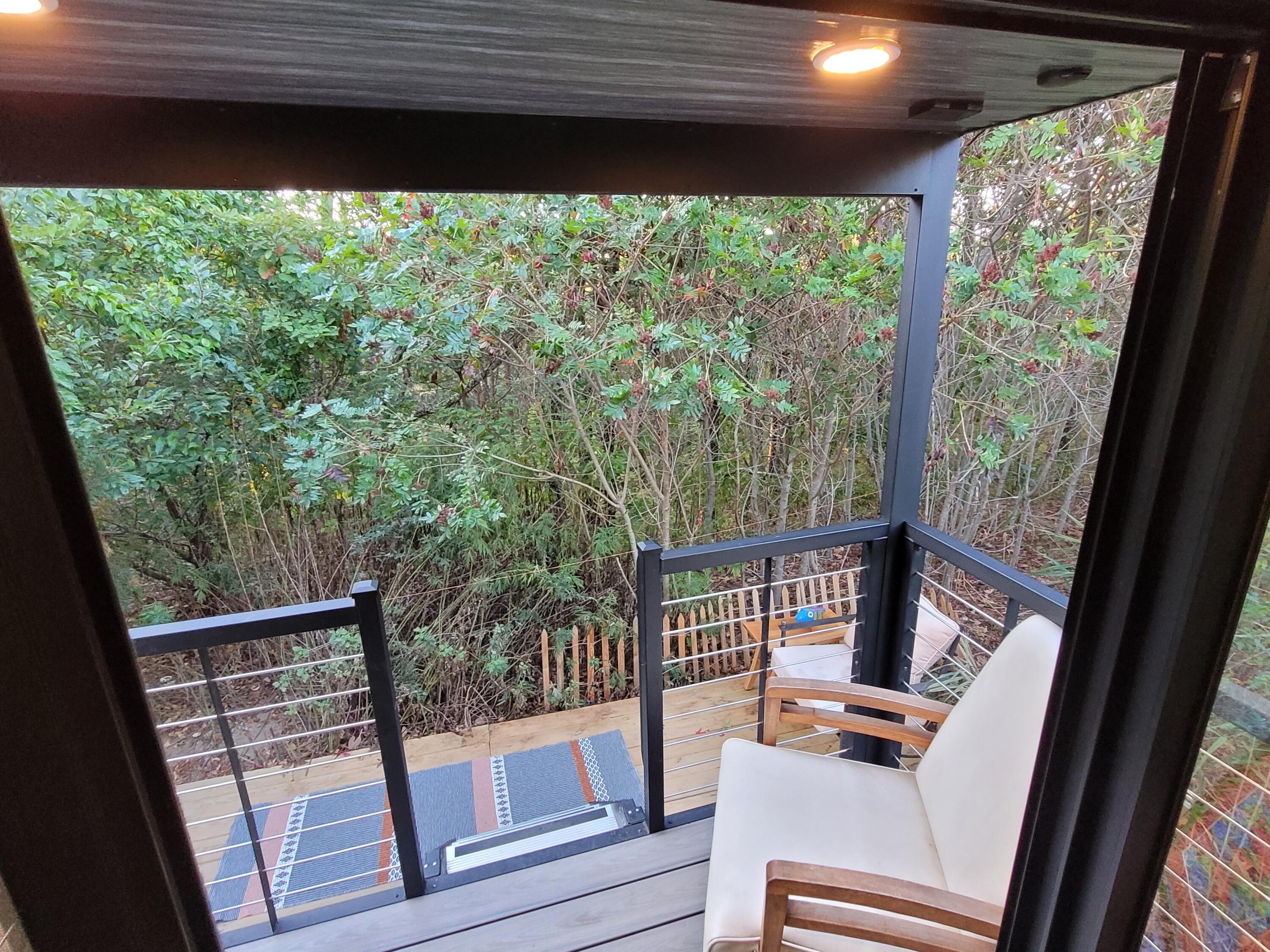 71 South Highland Road, Unit 235 Truro, MA 02666 - Photo 70 of 74 a view of balcony with wooden floor