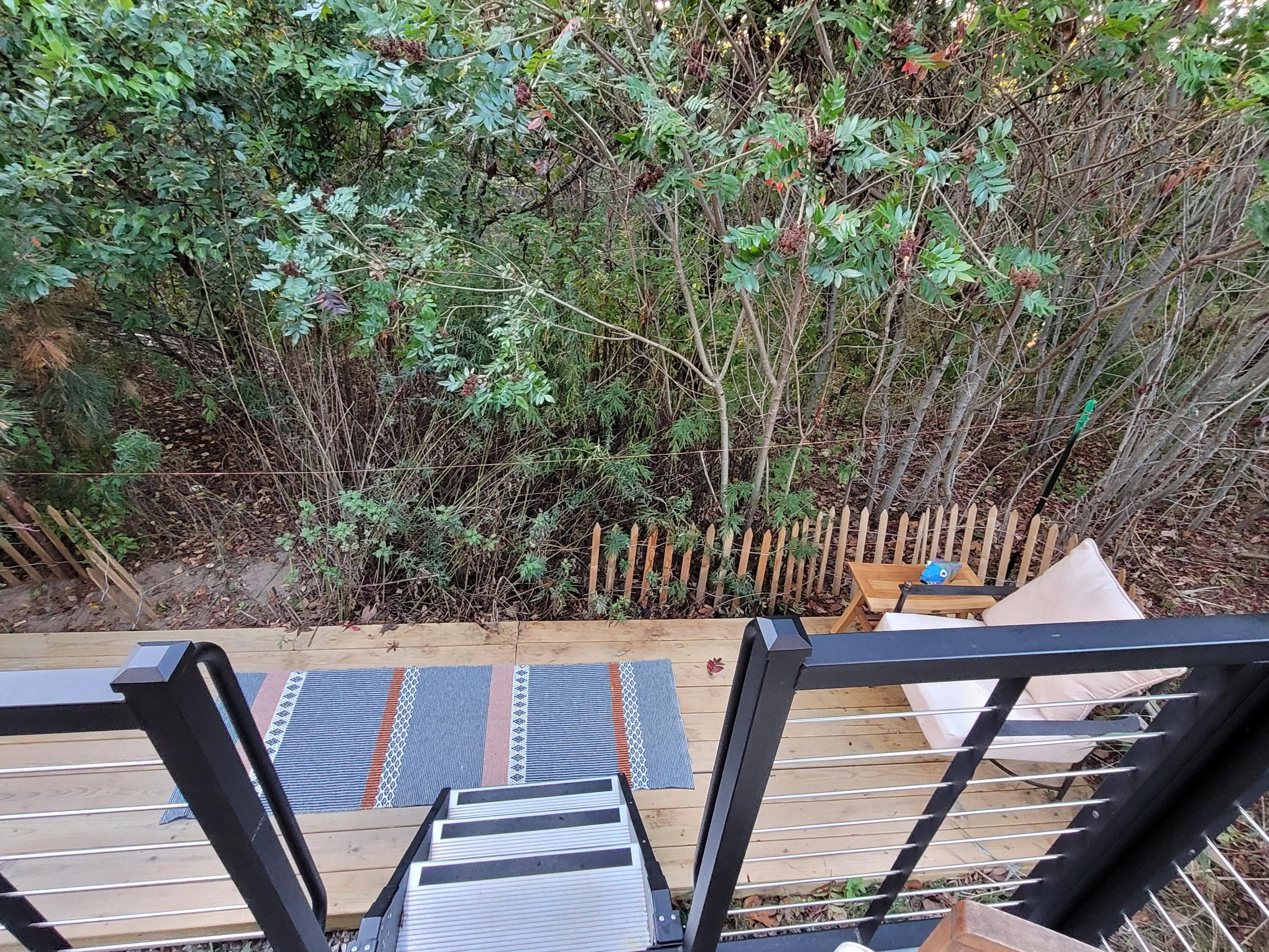 71 South Highland Road, Unit 235 Truro, MA 02666 - Photo 71 of 74 a balcony with chairs