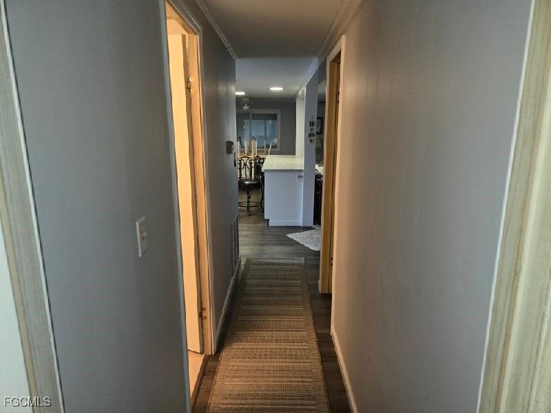 9 Elder Alva, FL 33920 - Photo 11 of 12 a view of a hallway with a livingroom and a bathroom with sink