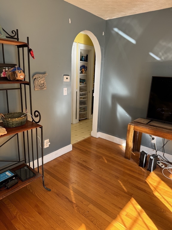 4 Benjamin Road Worcester, MA 01602 - Photo 3 of 10 a bedroom with a bed and a mirror