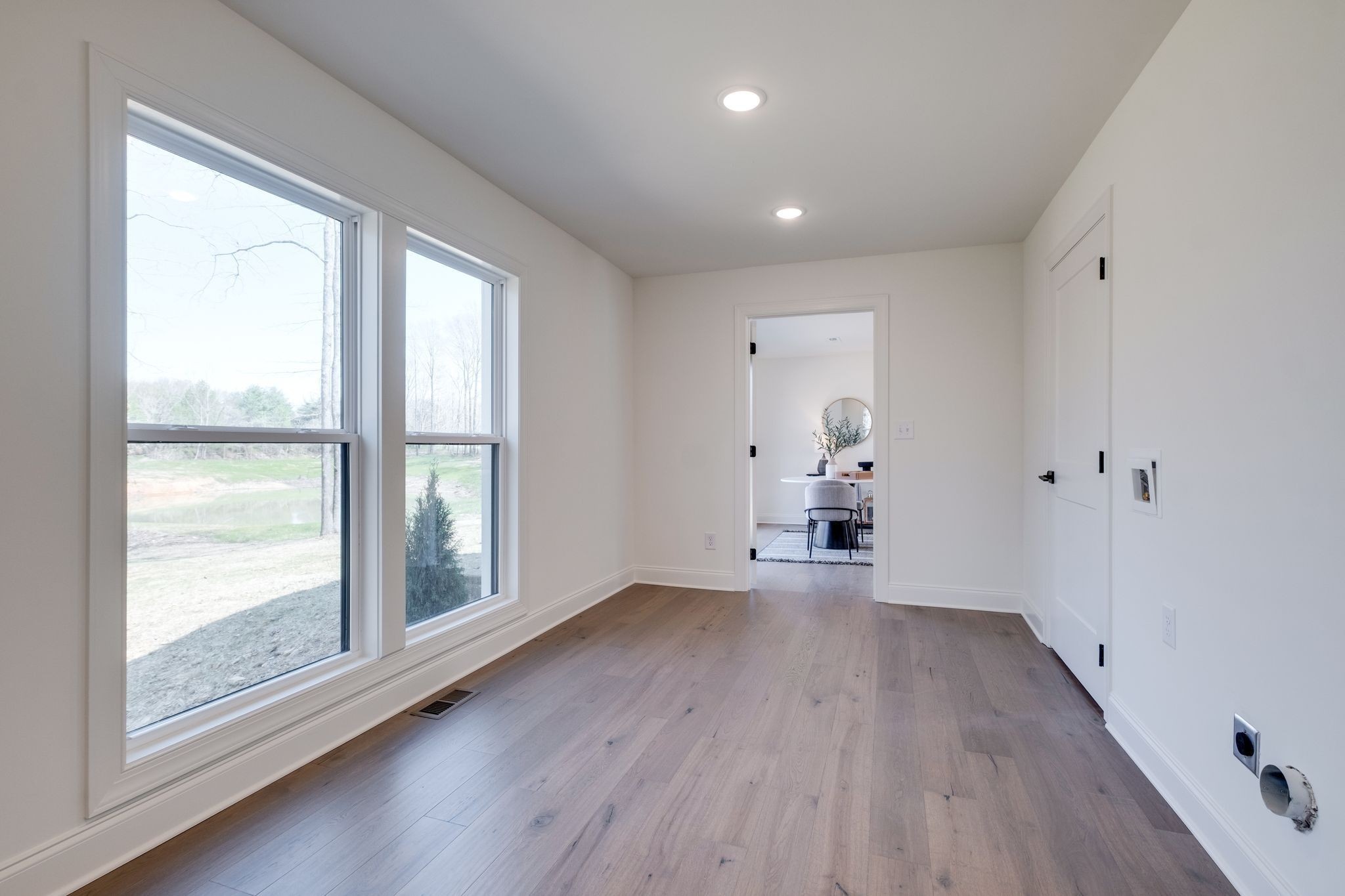 1510 East Piney Road Dickson, TN 37055 - Photo 52 of 66 a view of empty room with wooden floor and fan