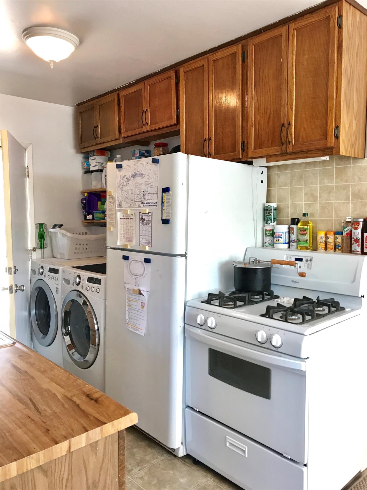 160 Grapevine Road Oak View, CA 93022 - Photo 11 of 35 a kitchen with stainless steel appliances granite countertop a refrigerator and a stove