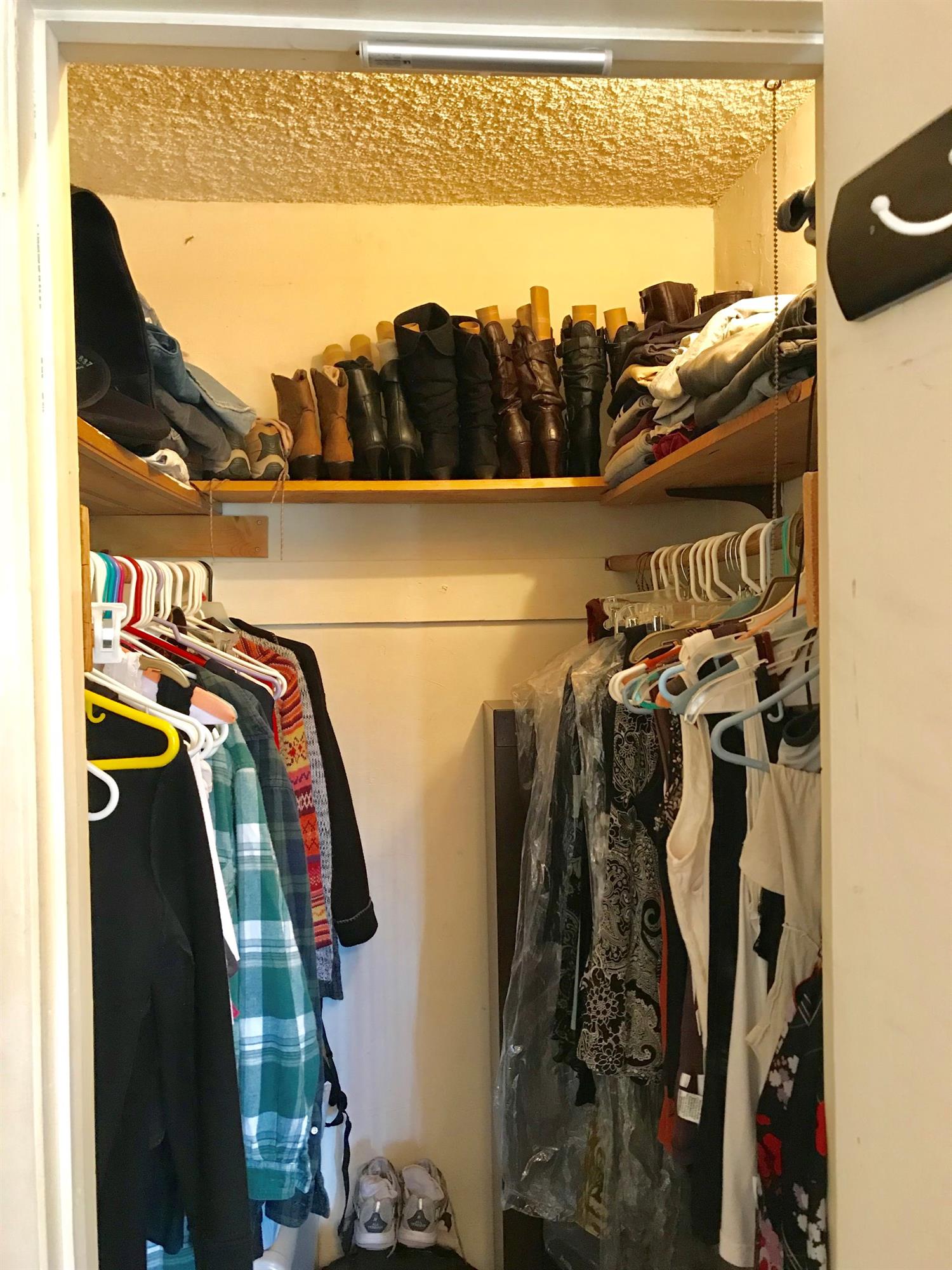 160 Grapevine Road Oak View, CA 93022 - Photo 17 of 35 a view of walk in closet with clothes and shoes