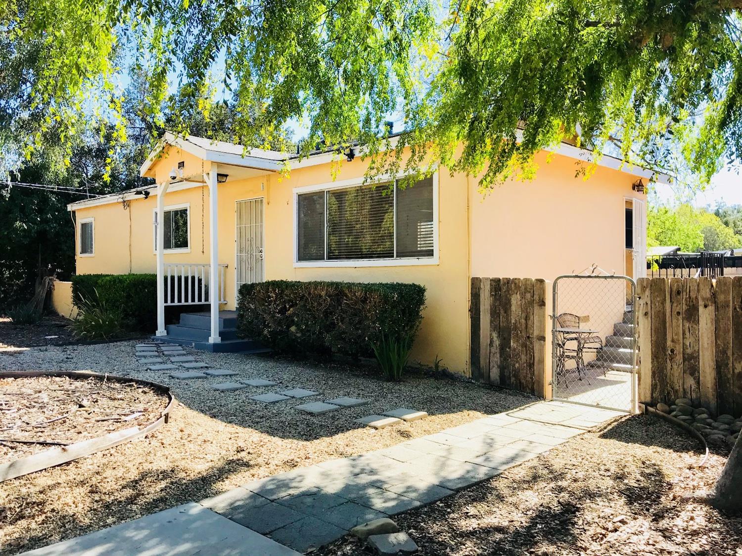 160 Grapevine Road Oak View, CA 93022 - Photo 2 of 35 a view of a house with a yard covered in snow