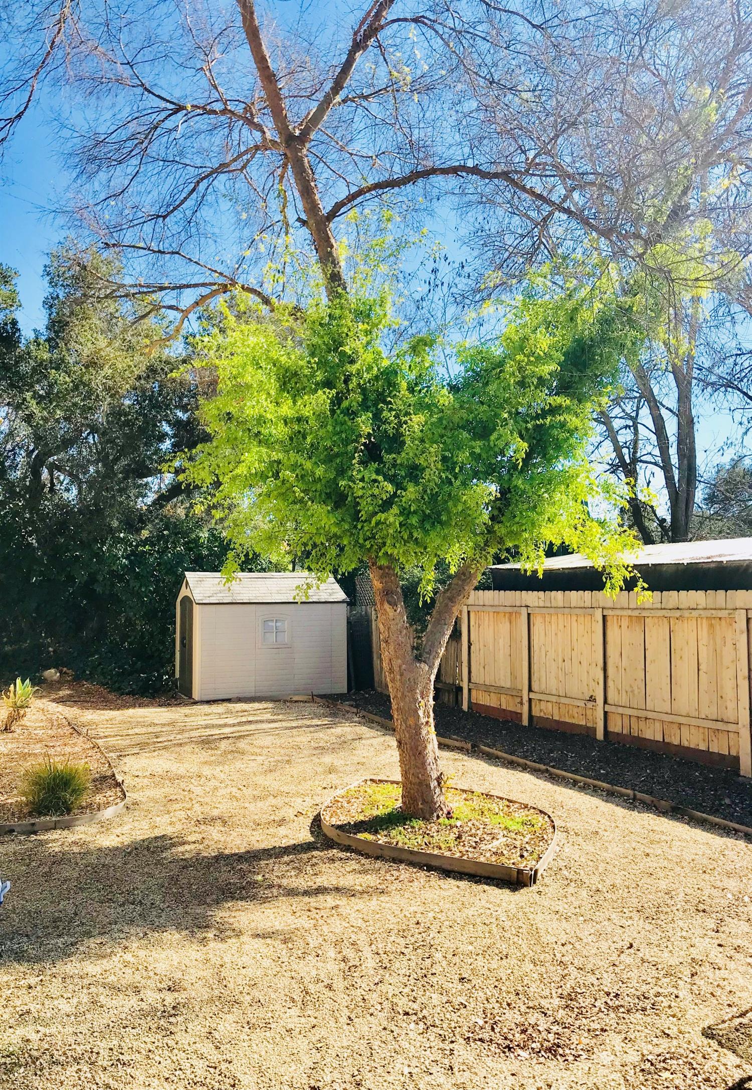160 Grapevine Road Oak View, CA 93022 - Photo 31 of 35 a white house that has a tree in front of it