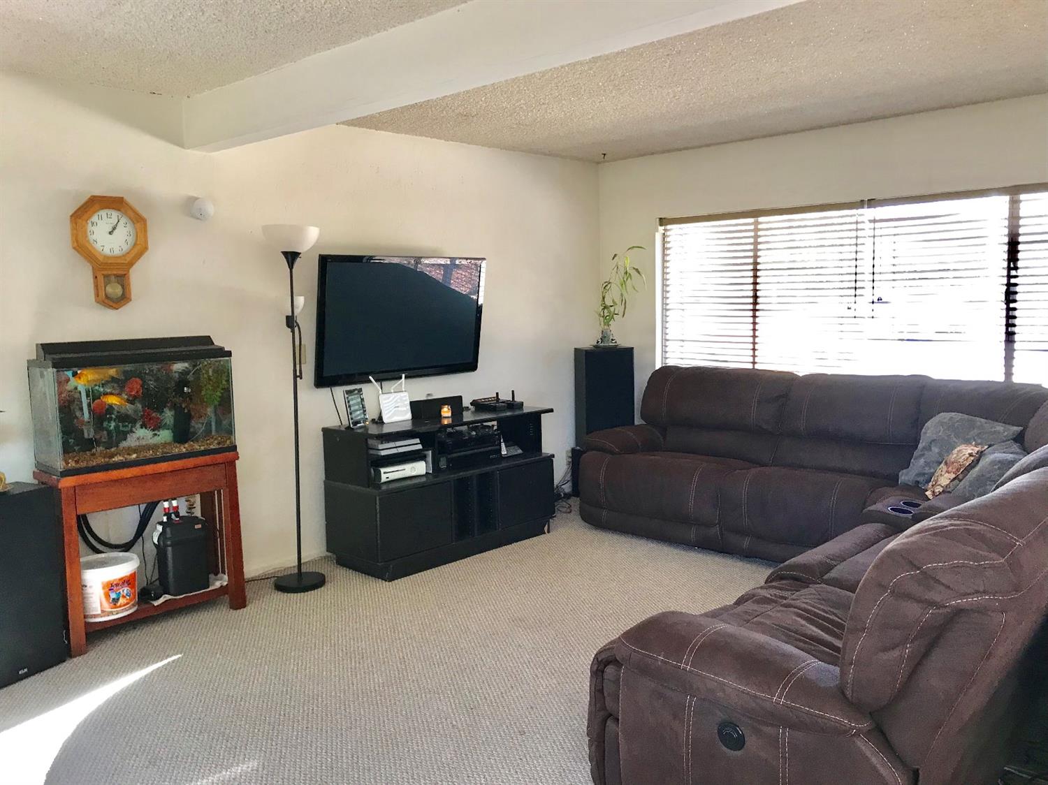 160 Grapevine Road Oak View, CA 93022 - Photo 4 of 35 a living room with furniture and a flat screen tv