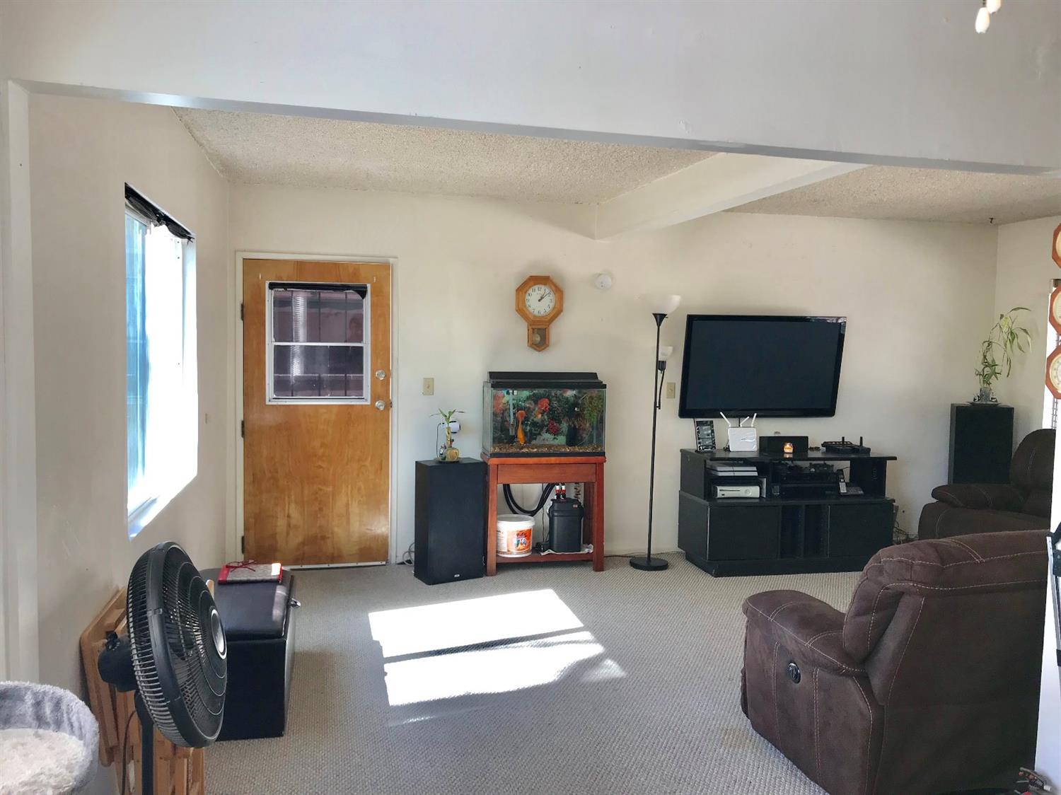 160 Grapevine Road Oak View, CA 93022 - Photo 6 of 35 a living room with furniture and a flat screen tv
