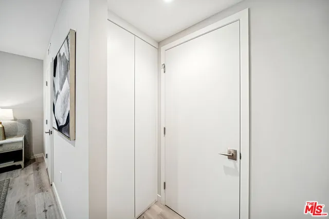 a bathroom with a shower and a sink