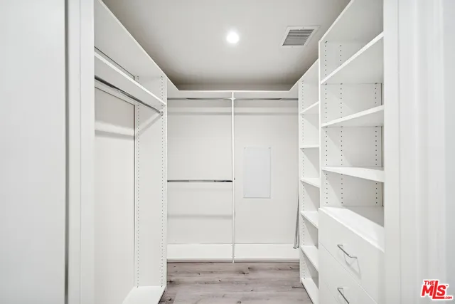 a view of an empty walk in closet