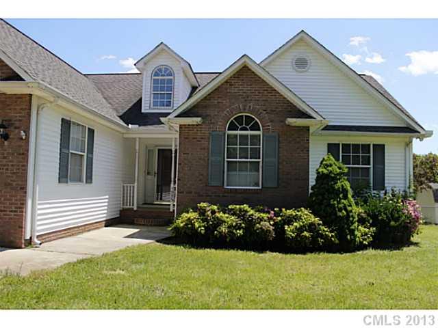 1525 West Ridge Road Salisbury, NC 28147 - Photo 14 of 16 a front view of a house with a yard