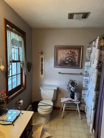 a living room with furniture and window