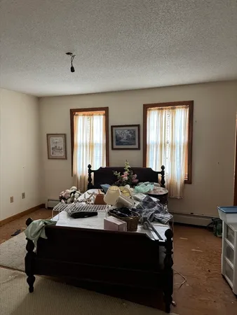 a living room with furniture and windows