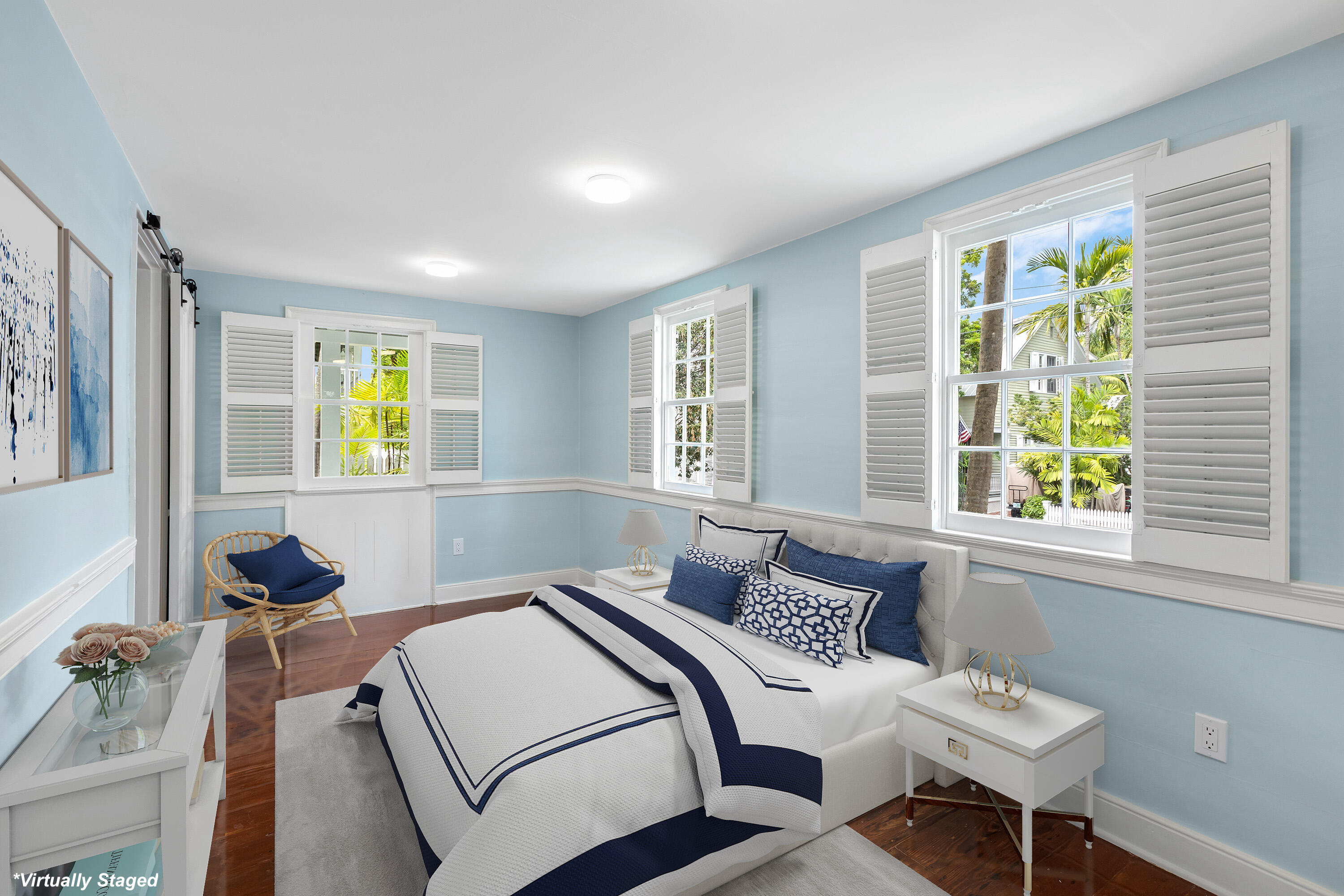 408 William Street Key West, FL 33040 - Photo 12 of 58 a bedroom with a bed and a window