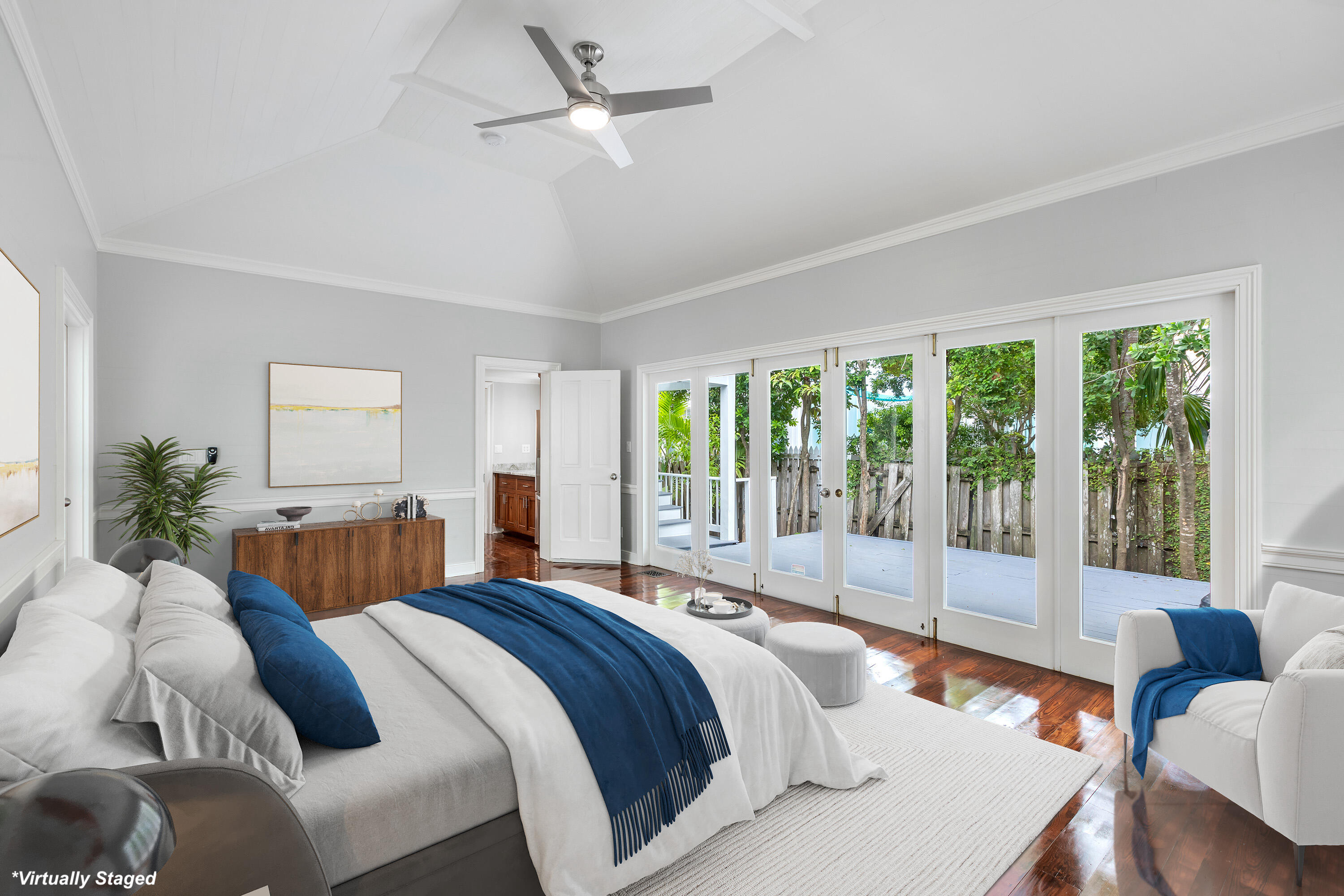 408 William Street Key West, FL 33040 - Photo 15 of 58 a bedroom with a bed and a large window