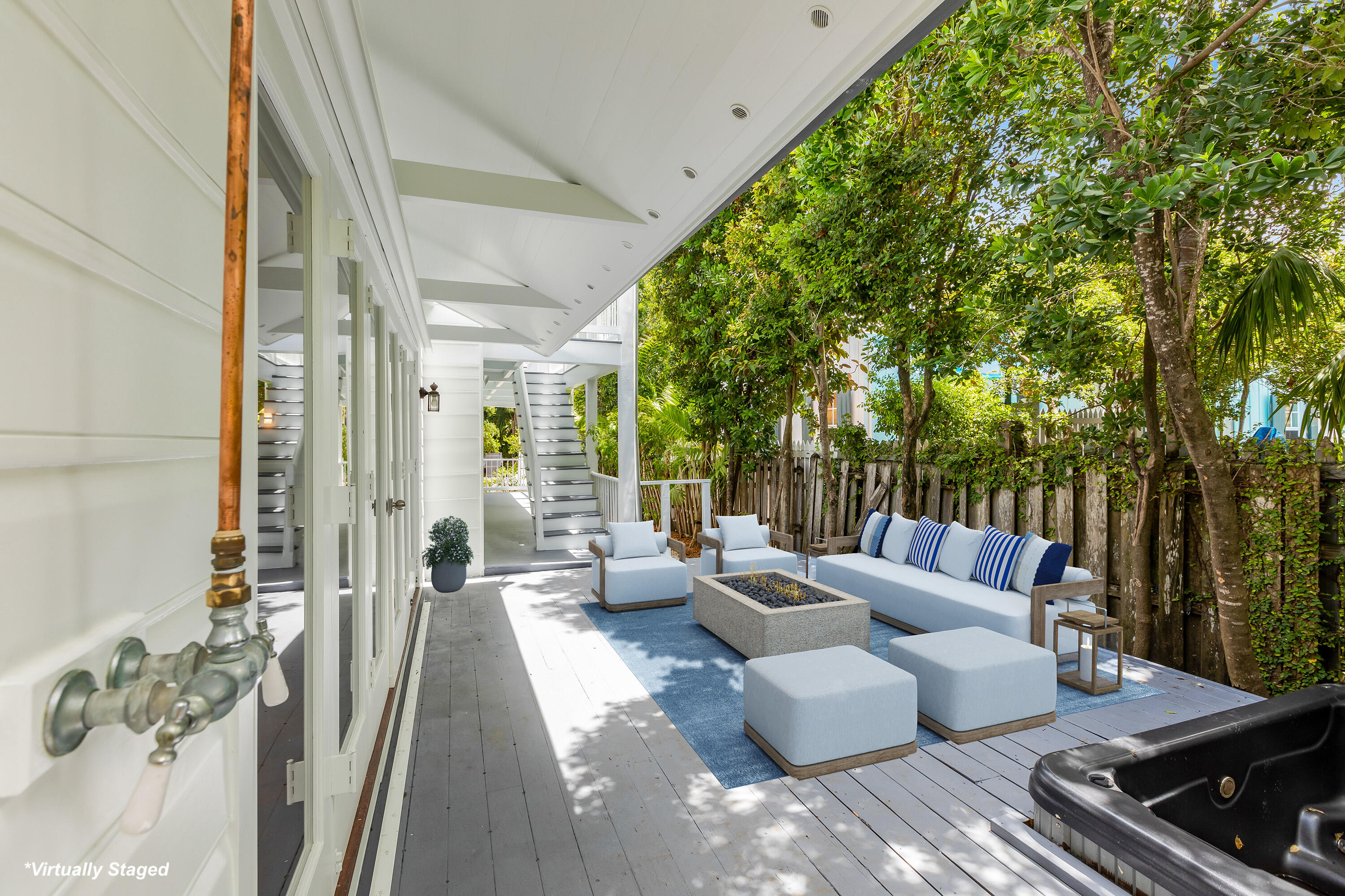 408 William Street Key West, FL 33040 - Photo 20 of 58 a patio with patio area and glass windows