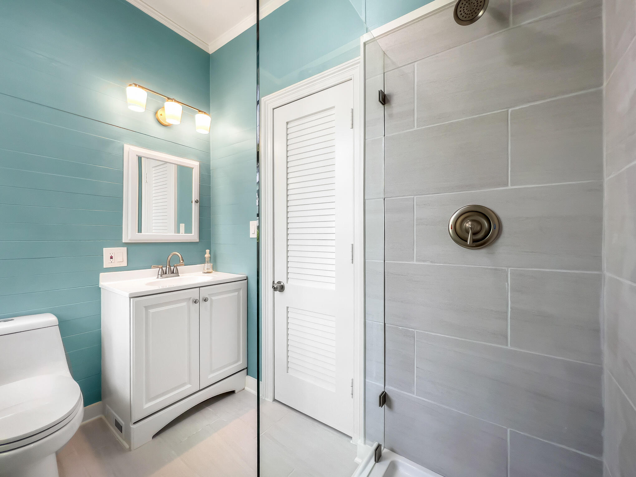 408 William Street Key West, FL 33040 - Photo 34 of 58 a bathroom with a sink a toilet and shower