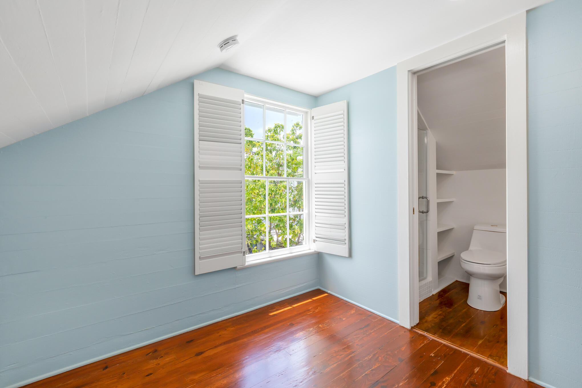 408 William Street Key West, FL 33040 - Photo 42 of 58 a view of an empty room with a window