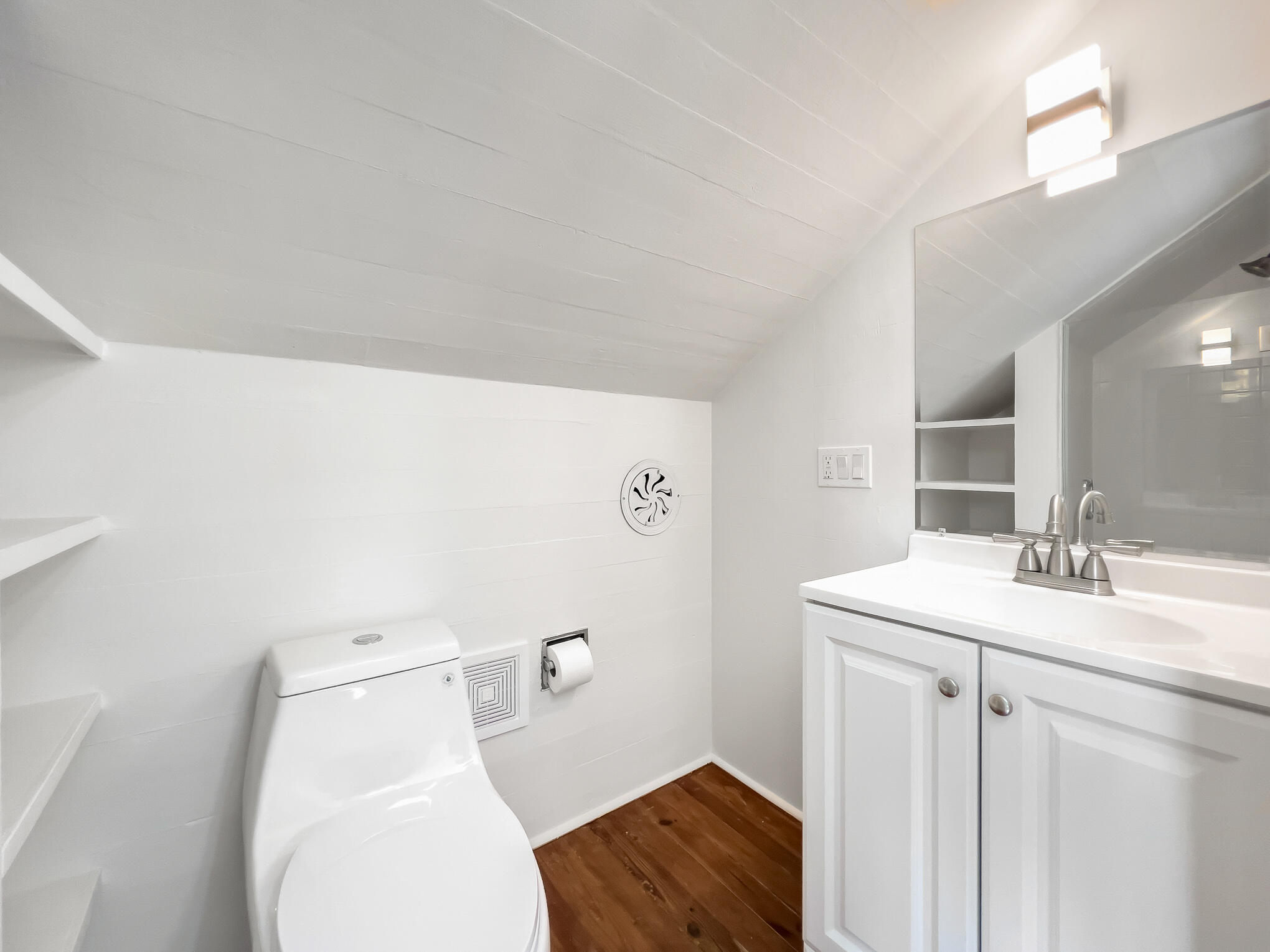 408 William Street Key West, FL 33040 - Photo 44 of 58 a bathroom with a toilet a sink and mirror