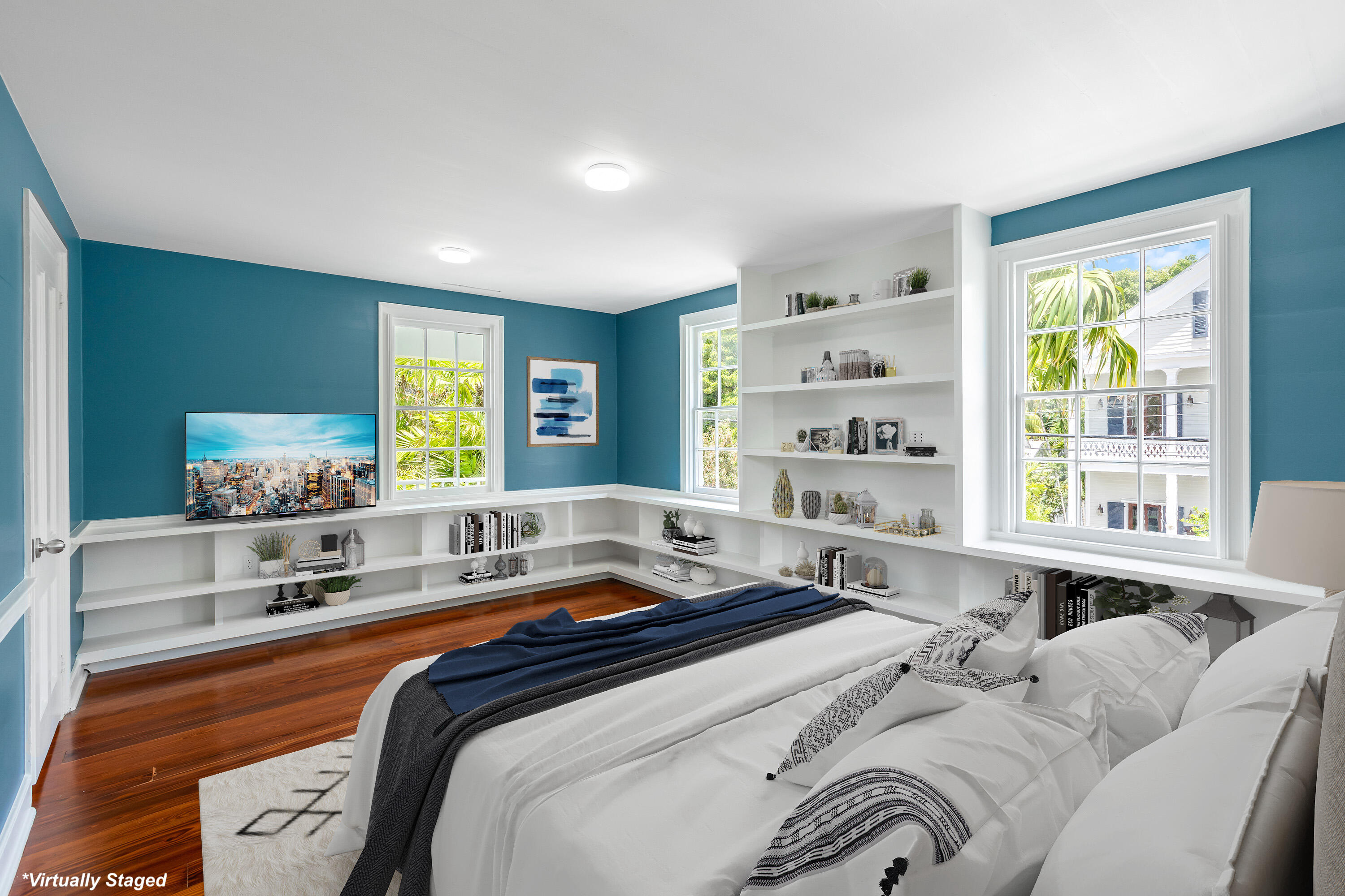 408 William Street Key West, FL 33040 - Photo 49 of 58 a bedroom with a bed and a large window