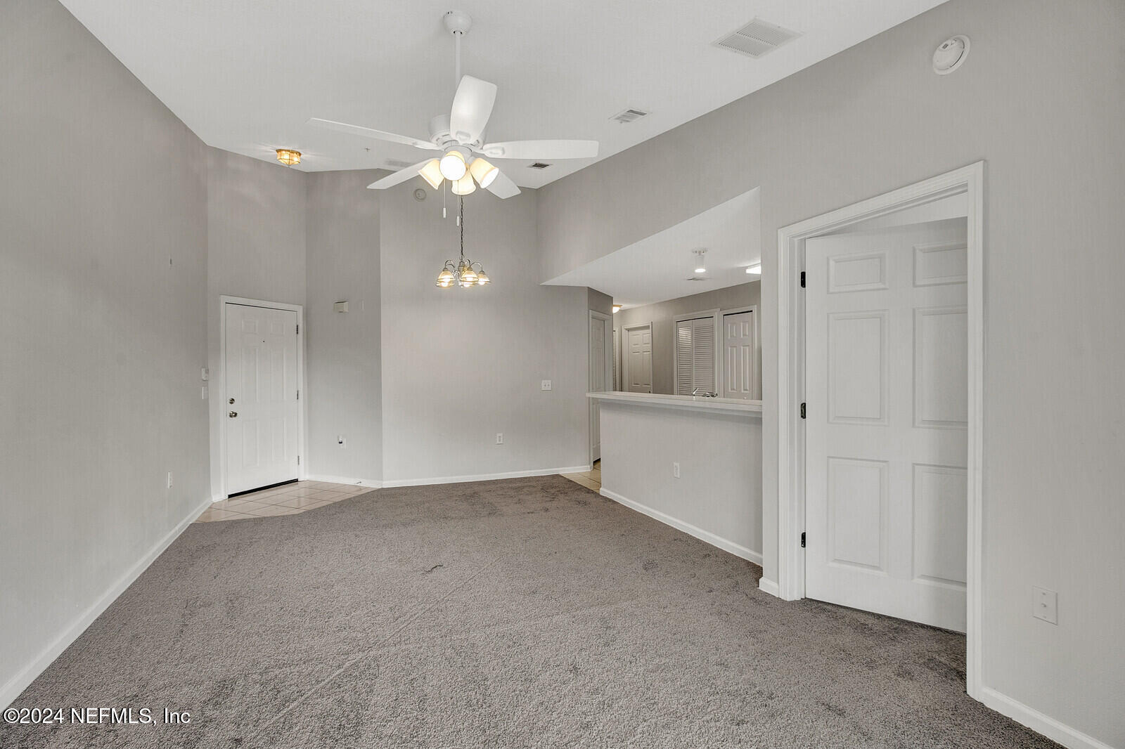 7920 Merrill Road, Unit 1411 Jacksonville, FL 32277 - Photo 18 of 18 a view of an empty room with a bathroom