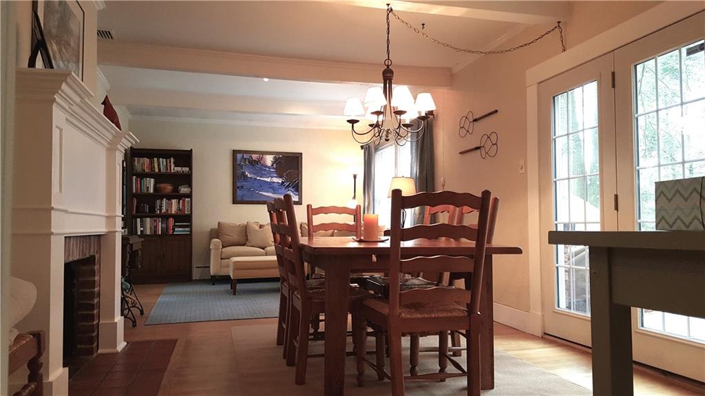 1 Penhurst Road Ben Avon Heights, PA 15202 - Photo 9 of 25 Open concept dining area complete with trimmed out fireplace and side deck.