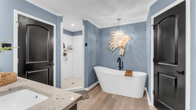 a kitchen with a refrigerator and a sink