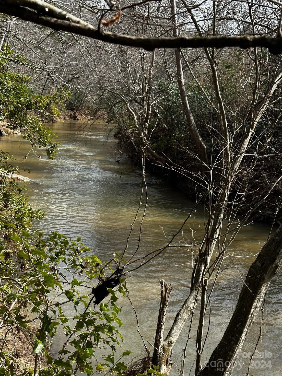 408-410 Huckleberry Ridge Road Hiddenite, NC 28636 - Photo 2 of 11 a view of a lake