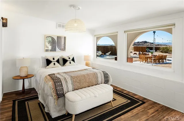 a bathroom with a sink a mirror and a toilet