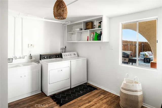 a view of roof deck with a barbeque and wooden stairs