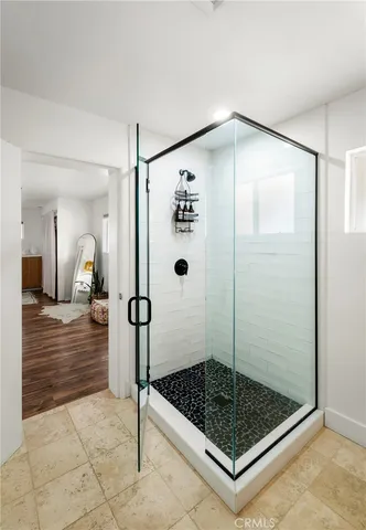 a view of a terrace with chairs and swimming pool