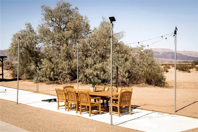 a view of a terrace with snow on the road