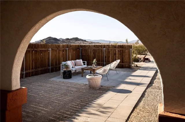an aerial view of houses with outdoor space