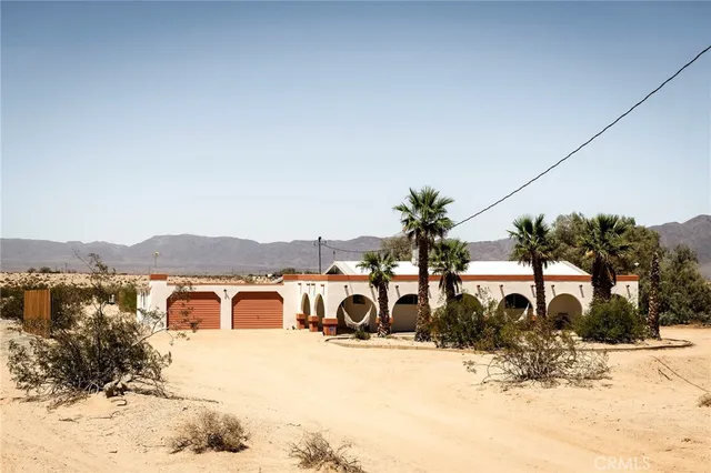 a view of a backyard of snow