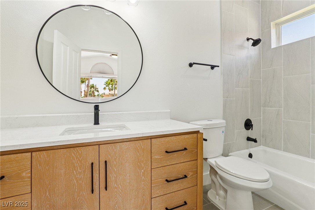 2469 Sun Reef Road Las Vegas, NV 89128 - Photo 62 of 93 Bathroom with vanity and washtub / shower combination