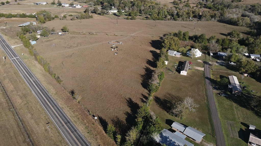 1496 Farm To Market 149 Anderson, TX 77830 - Photo 20 of 22 an aerial view of a house with a yard